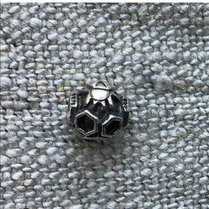 Searching for trollbead bee on a hive charm